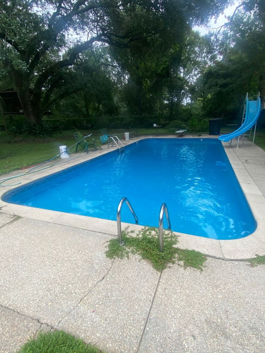 Backyard pool after cleaning, clear water