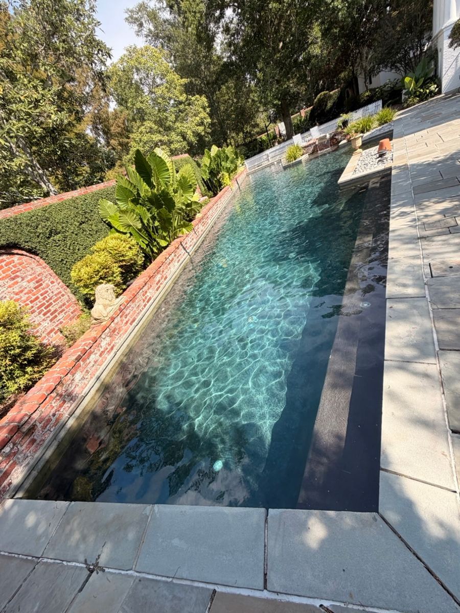 Clean, clear pool maintained by Integrity Touch