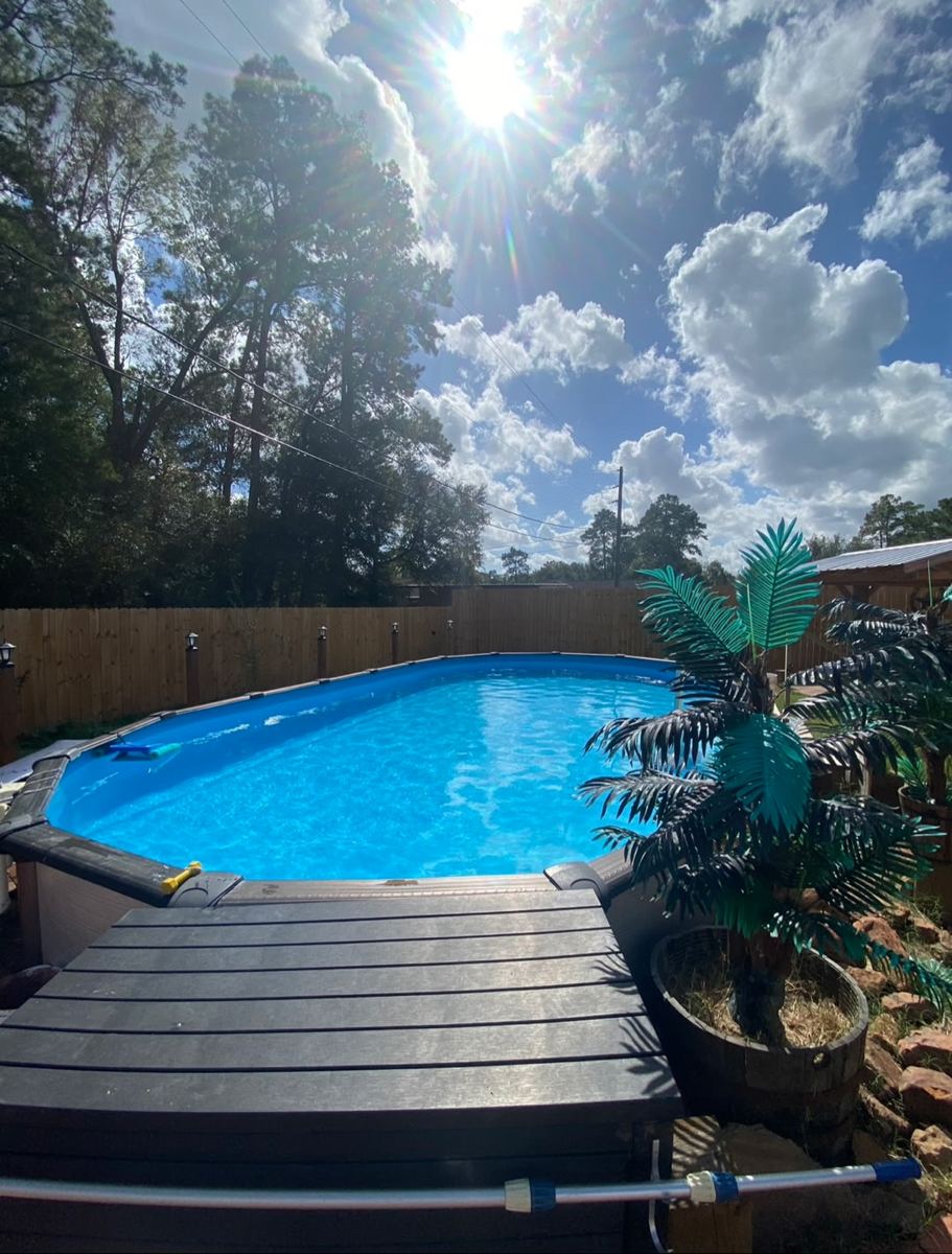 Clean, clear pool maintained by Integrity Touch