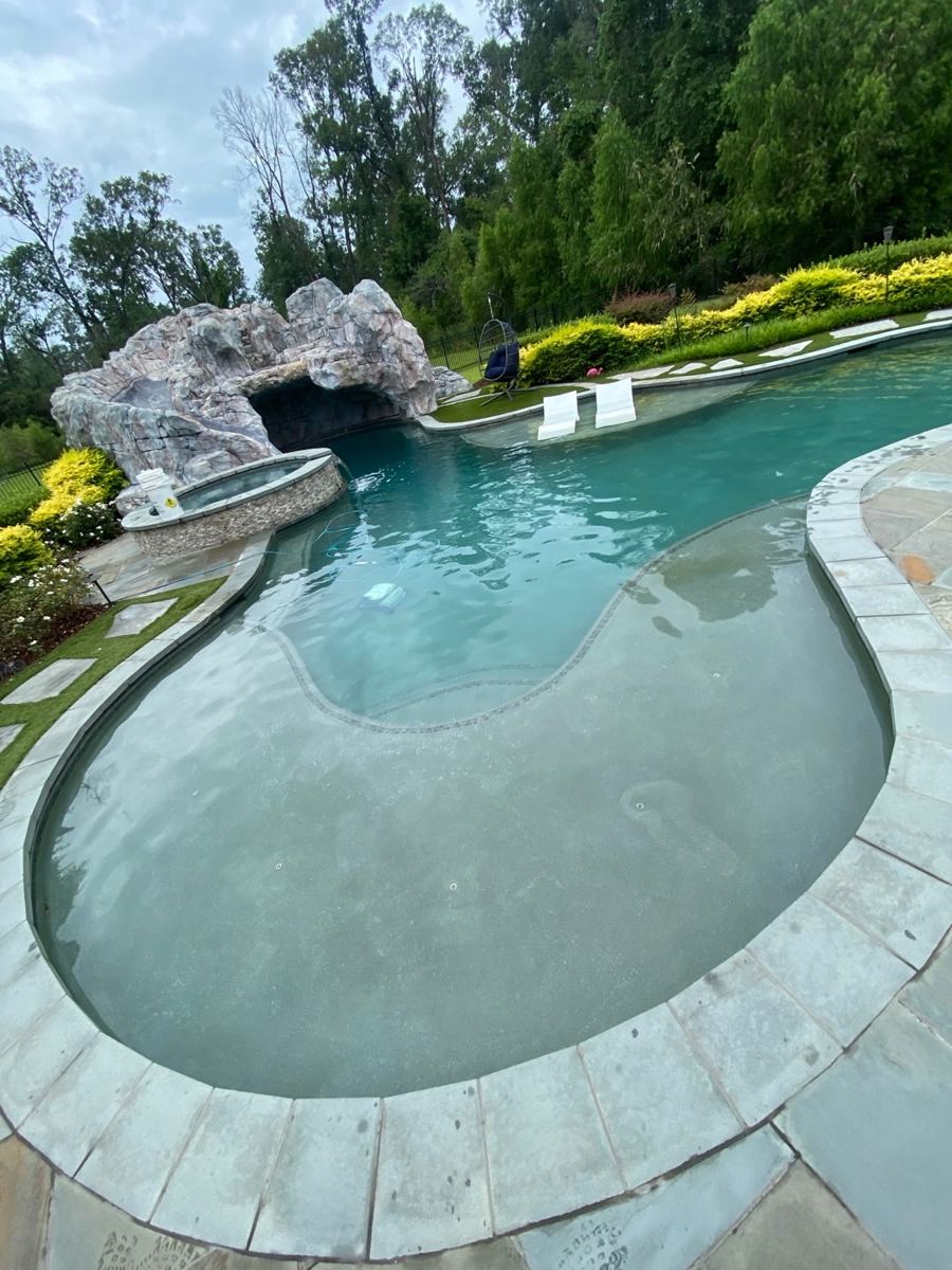 Grotto pool after cleaning, clear water